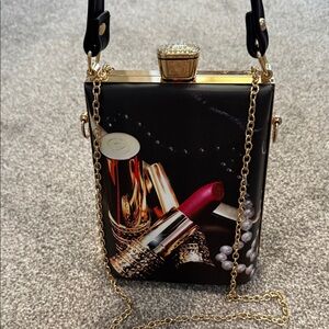 Elegant Black and Gold Women's Bag